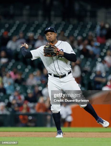 Third baseman Jonathan Schoop of the Detroit Tigers throws out Travis d'Arnaud of the Atlanta Braves at first base on a grounder during the 10th...