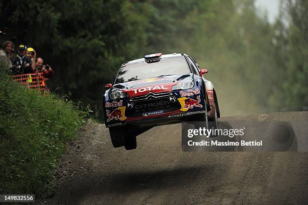 Sebastien Loeb of France and Daniel Elena of Monaco compete in their Citroen Total WRT Citroen DS3 WRC during Day 3 of the WRC Rally Finland on...