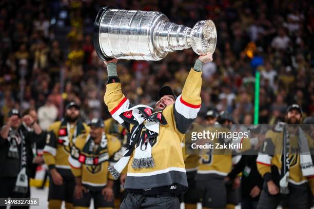 Alec Martinez of the Vegas Golden Knights celebrates with the Stanley Cup after a 9-3 victory against the Florida Panthers in Game Five of the 2023...