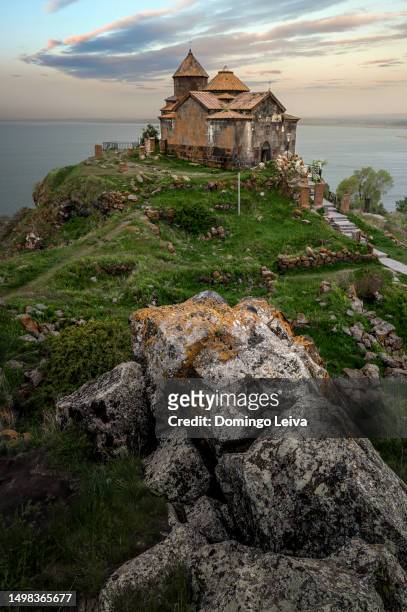 view of hayravank monastery, lake sevan, armenia - armenian church stock pictures, royalty-free photos & images