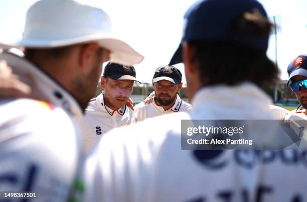 Nick Browne and Tom Westley of Essex gather at the start of play during the LV= Insurance County Championship Division 1 match between Essex and...