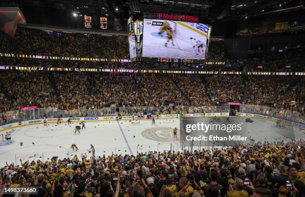 Hats are thrown onto the ice after Mark Stone of the Vegas Golden Knights scored an empty-net goal, his third goal of the game, in the third period...