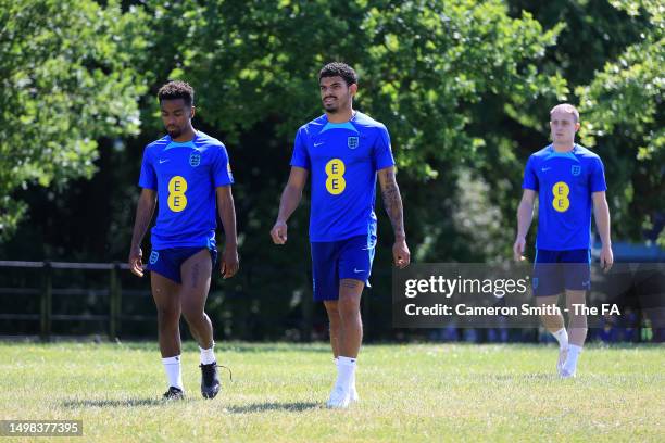 Angel Gomes and Morgan Gibbs-White of England look on during a training session at St George's Park on June 14, 2023 in Burton upon Trent, England.