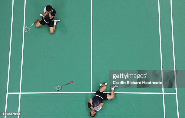 Yong Dae Lee and Jae Sung Chung of Korea react after winning their Men's Doubles Badminton Bronze Medal match against Boon Heong Tan and Kien Keat...