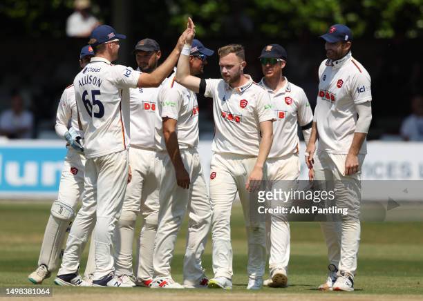 Sam Cook of Essex celebrates taking the wicket of Kasey Aldridge of Somerset during the LV= Insurance County Championship Division 1 match between...