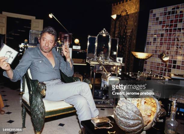 French author, actor, singer and songwriter Serge Gainsbourg at home on rue de Verneuil, in Paris.