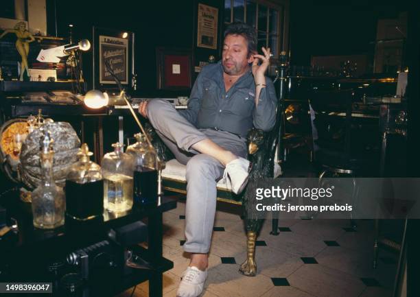 French author, actor, singer and songwriter Serge Gainsbourg at home on rue de Verneuil, in Paris.