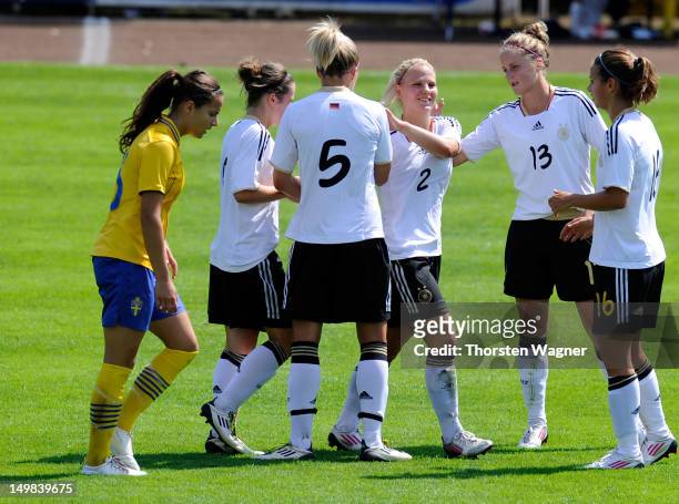 Players of Germany celebrates after Nicole Rolser is scoring her teams seventh goal during the women's U20 international friendly match between...