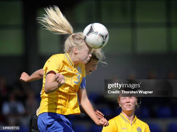 Luisa Wensing of Germany battles for the ball with Amanda Ilestedt of Sweden during the women's U20 international friendly match between Germany and...