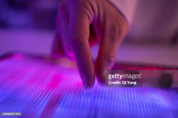 close-up of touching digital tablet - viollet creative selects stock pictures, royalty-free photos & images