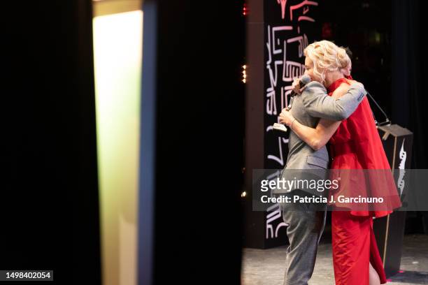 Belen Rueda hugs Alejandro Amenabar onstage during the opening ceremony of Alicante Film Festival 2023 at Teatro Principal on June 03, 2023 in...