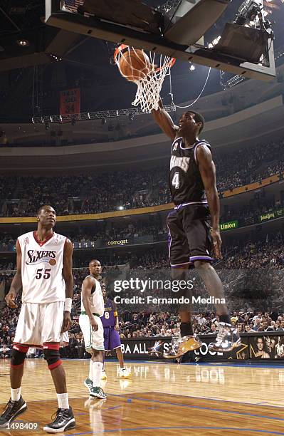 Chris Webber of the Sacramento Kings dunks during the 2002 NBA All-Star game at the First Union Center during the 2002 NBA All-Star Weekend in...