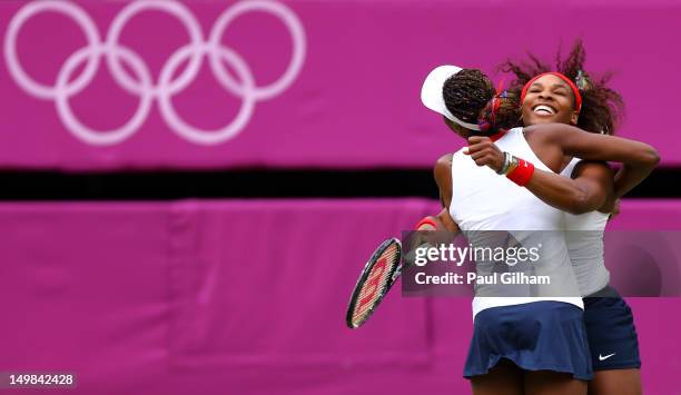 Serena Williams and Venus Williams of the United States celebrate after defeating Andrea Hlavackova and Lucie Hradecka of Czech Republic in the...