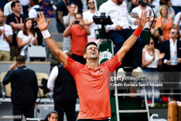 Novak Djokovic of Serbia celebrates after winning Casper Ruud of Norway during the Mens Single Final on Day Fifteen of the 2023 French Open at Roland...