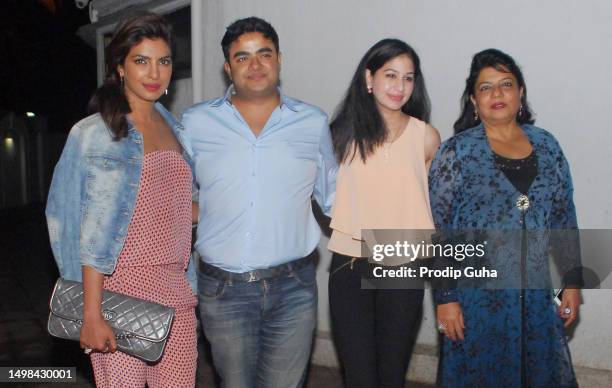 Siddharth chopra, Ishita Kumar and Madhu Chopra attend Priyanka Chopra's birthday celebration on July 25, 2014 in Mumbai, India