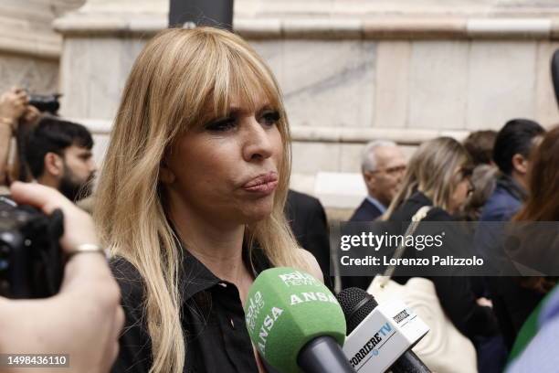 Alessandra Mussolini is seen in front of the Duomo cathedral in Milan ahead of the state funeral for Italy's former prime minister and media tycoon...