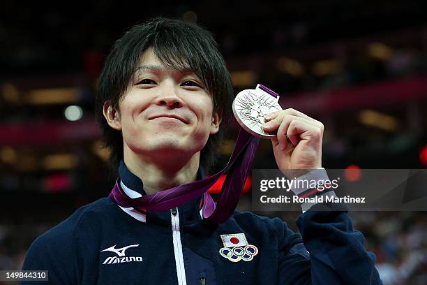 Kohei Uchimura of Japan celebrates with his silver medal during the medal ceremony for the Artistic Gymnastics Men's Floor Exercise final on Day 9 of...