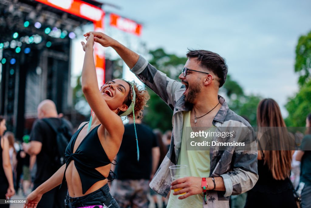 Dancing couple at concert