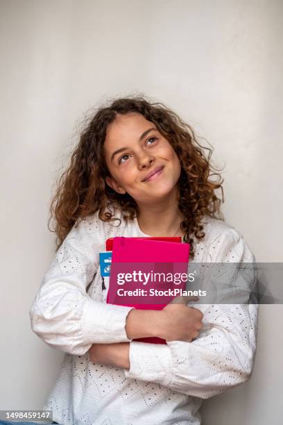 Hugging Books 3,199 Girl Hugging Books Stock Photos, High-Res Pictures, and Images ...