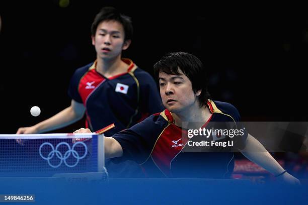 Seiya Kishikawa and Koki Niwa of Japan competes during Men's Team Table Tennis quarterfinal match against team of Hong Kong, China on Day 9 of the...