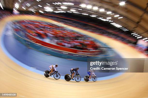 Juliana Gaviria of Colombia, Natasha Hansen of New Zealand and Ekaterina Gnidenko of Russia compete in the Women's Sprint Track Cycling 1/16 Final...