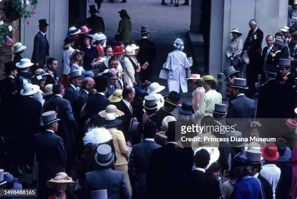 Elevated view of onlookers as they watch members of the British Royal family and others attend the Royal Ascot, at the Ascot Racecourse, Ascot,...