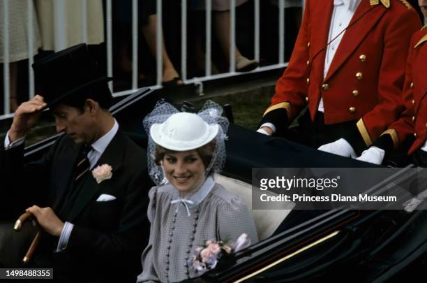 Engaged couple Prince Charles and Lady Diana Spencer ride in a carriage during the Royal Ascot, at the Ascot Racecourse, Ascot, England, June 19,...