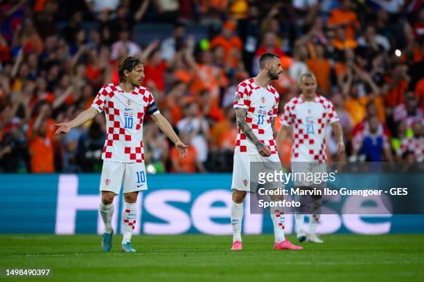 Luka Modric , Marcelo Brozovic looks dejected after first goal for Netherlands during the UEFA Nations League 2022/23 semifinal match between...