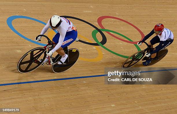 Britain's Victoria Pendleton competes against Russia's Ekaterina Gnidenko during the London 2012 Olympic Games women's sprint round of 16 cycling...