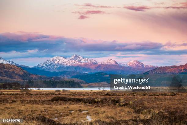 uk, scotland, loch shiel at dusk with mountains in background - loch moidart stock pictures, royalty-free photos & images