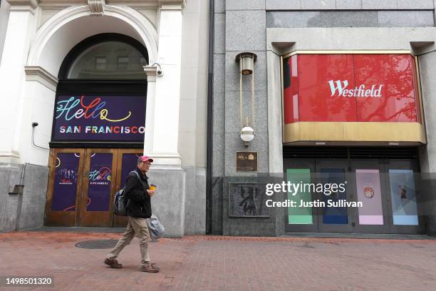 Pedestrian walks by a sign in front of the Westfield San Francisco Centre on June 14, 2023 in San Francisco, California. San Francisco's downtown...