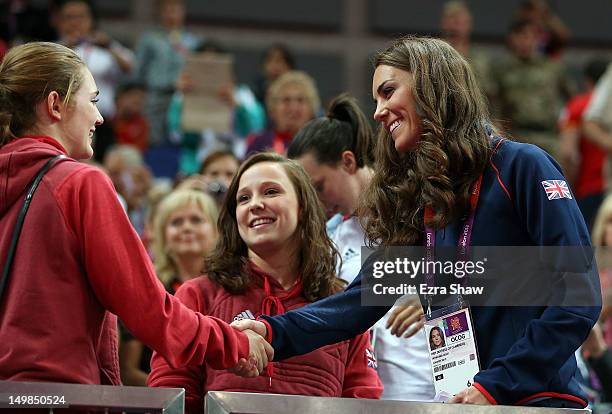 Catherine, Duchess of Cambridge greets gymnasts Jennifer Pinches and Rebecca Tunney during the Artistic Gymnastics Men's Pommel Horse final on Day 9...