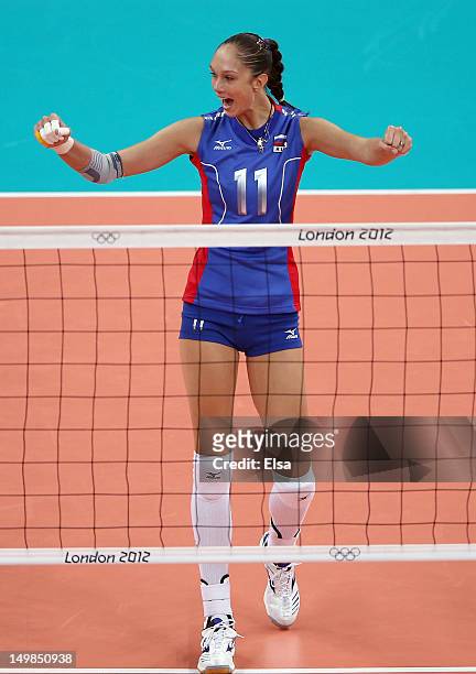 Ekaterina Gamova of Russia celebrates a point win in the first set against Italy during Women's Volleyball on Day 9 of the London 2012 Olympic Games...
