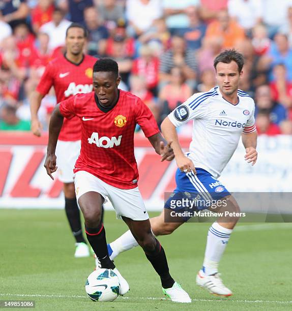 Danny Welbeck of Manchester United clashes with Kristopher Haestad of Valerenga FC during the pre-season match between Valerenga FC and Manchester...