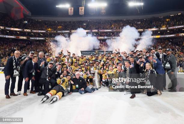 Members of the Vegas Golden Knights pose with the Stanley Cup after defeating the Florida Panthers to win the championship in Game Five of the 2023...