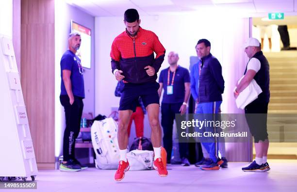 Novak Djokovic of Serbia warms up moments before walking out on to the court for his second round match on Day 4 of the 2023 French Open at Roland...