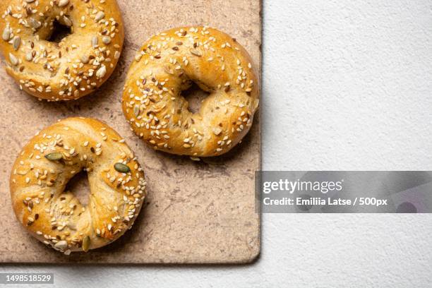 directly above shot of donuts in tray on table,russia - pastry dough stock pictures, royalty-free photos & images