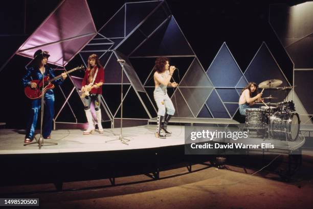 British rock band Geordie performing on the BBC music programme, 'Top Of The Pops', London, 1973. Left to right: Tom Hill, Vic Malcolm, Brian Johnson...