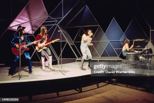 British rock band Geordie performing on the BBC music programme, 'Top Of The Pops', London, 1973. Left to right: Tom Hill, Vic Malcolm, Brian Johnson...