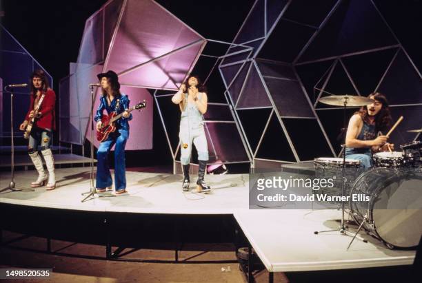 British rock band Geordie performing on the BBC music programme, 'Top Of The Pops', London, 1973. Left to right: Vic Malcolm, Tom Hill, Brian Johnson...