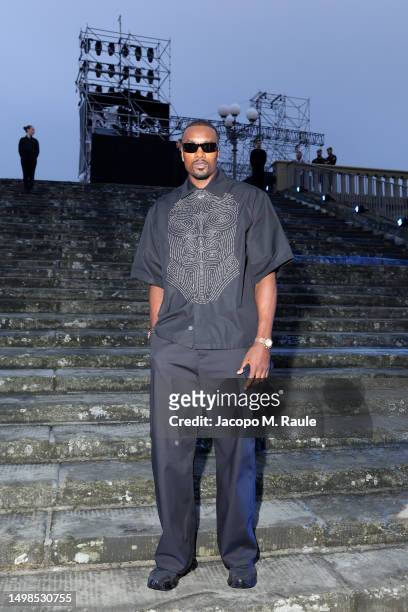 Serge Ibaka is seen front row during LuisaViaRoma & British Vogue – Runway Icons at Piazzale Michelangelo on June 14, 2023 in Florence, Italy.