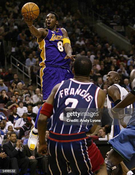 Kobe Bryant of the Los Angeles Lakers and the NBA Western Conference team shoots the ball during the NBA All-Star game at the First Union Center in...