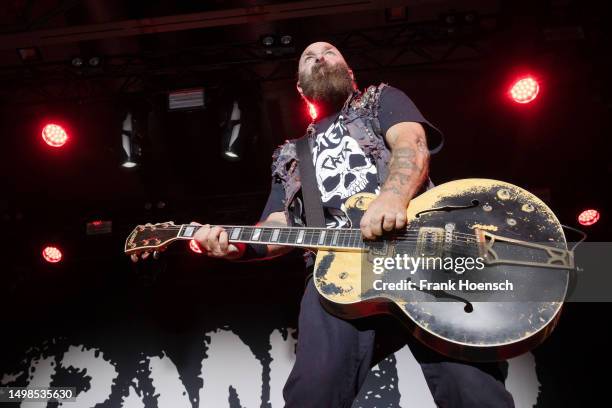 Singer Tim Armstrong of the American band Rancid performs live on stage during a concert at the Columbiahalle on June 12, 2023 in Berlin, Germany.