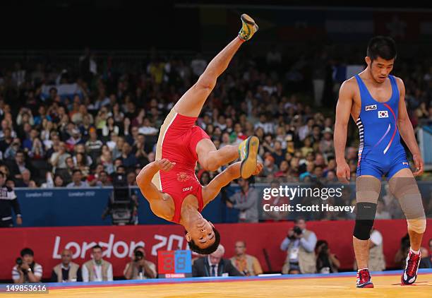 Mingiyan Semenov of Russia celebrates winning his Men's Greco-Roman 55 kg Wrestling Bronze Medal bout against Gyujin Choi of Korea on Day 9 of the...