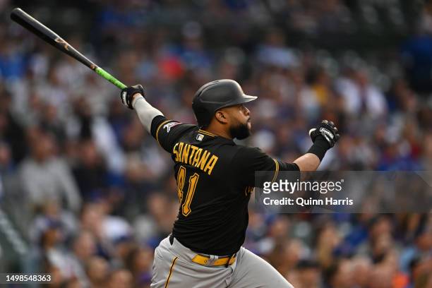 Carlos Santana of the Pittsburgh Pirates hits a two-run home run in the first inning against the Chicago Cubs at Wrigley Field on June 14, 2023 in...