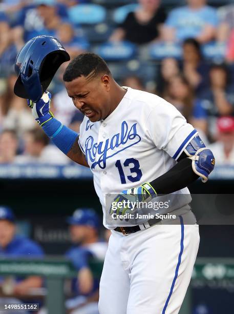 Salvador Perez of the Kansas City Royals reacts after being hit by a pitch during the 3rd inning of the game against the Cincinnati Reds at Kauffman...