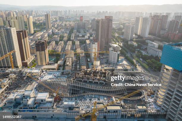 Aerial view of a footprint shape on the top of a shopping mall under construction on June 14, 2023 in Taiyuan, Shanxi Province of China.