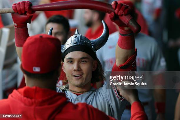 Stuart Fairchild of the Cincinnati Reds is congratulated by teammates in the dugout after hitting a home run during the 5th inning of the game...