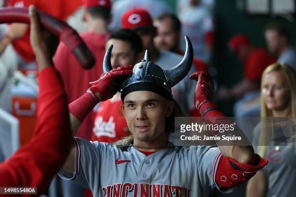Stuart Fairchild of the Cincinnati Reds is congratulated by teammates in the dugout after hitting a home run during the 5th inning of the game...