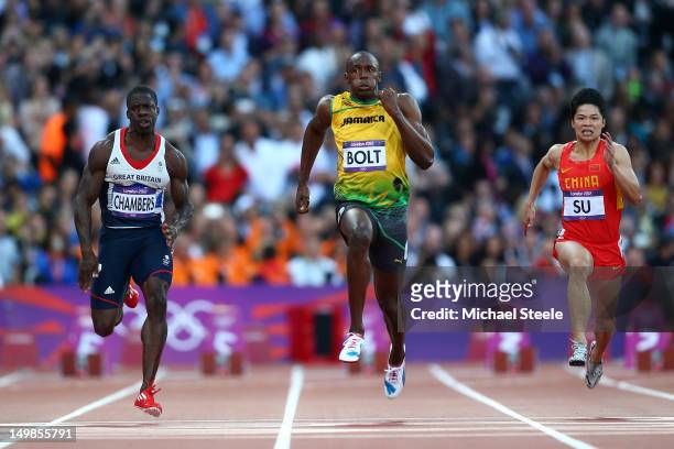 Dwain Chambers of Great Britain, Usain Bolt of Jamaica and Bingtian Su of China compete in the Men's 100m Semi Final on Day 9 of the London 2012...